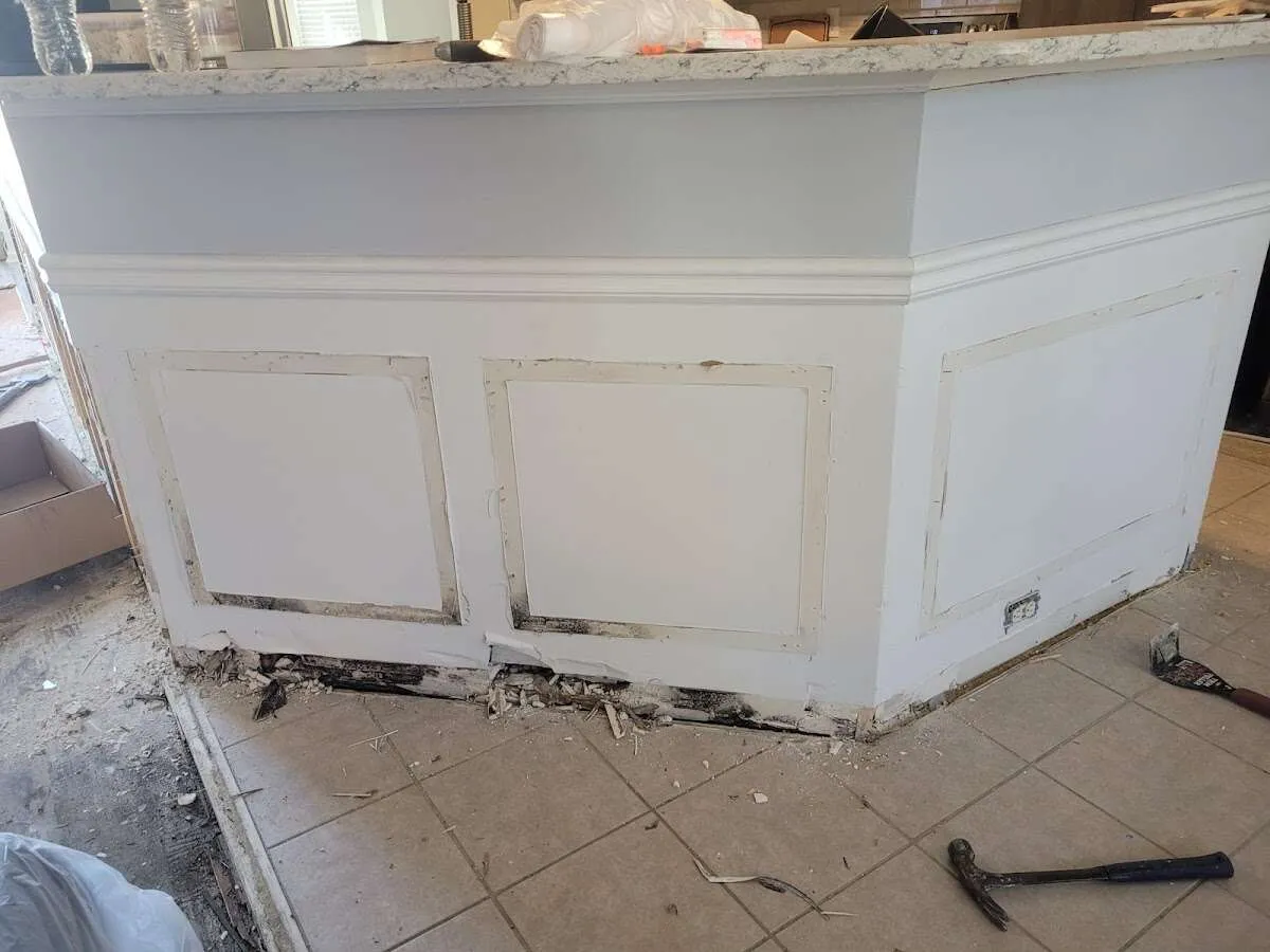 Water damage and mold on kitchen during Storm Damage Restoration in Brownville